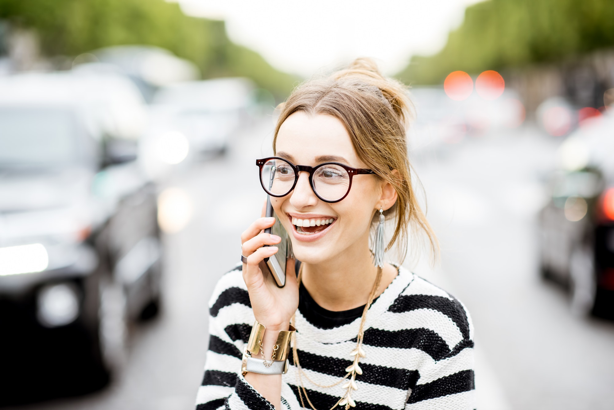 Business woman with phone on the street